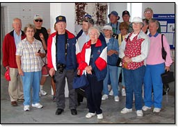 Members of the Great Lakes Lighthouse Keepers Association vist the fog signal building at Canada's beautiful Point Abino lighthouse